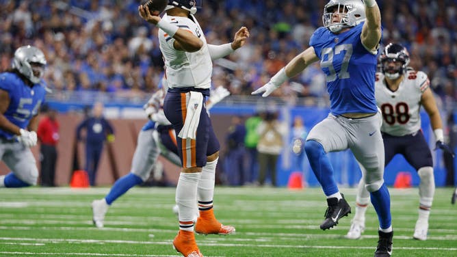 Bears QB Justin Fields throws a pass against the Lions at Ford Field.