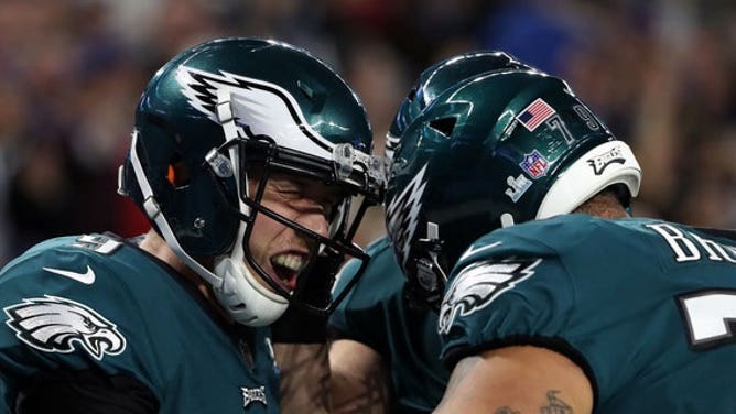 Philadelphia Eagles quarterback Nick Foles (9) celebrates after catching a pass for a touchdown against the New England Patriots during the second quarter in Super Bowl LII at U.S. Bank Stadium Feb 4, 2018, in Minneapolis.