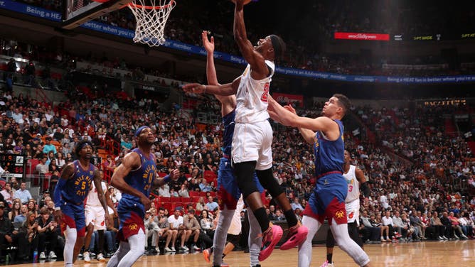 Heat SF Jimmy Butler gets to the rack on the Nuggets at Miami-Dade Arena in Miami.