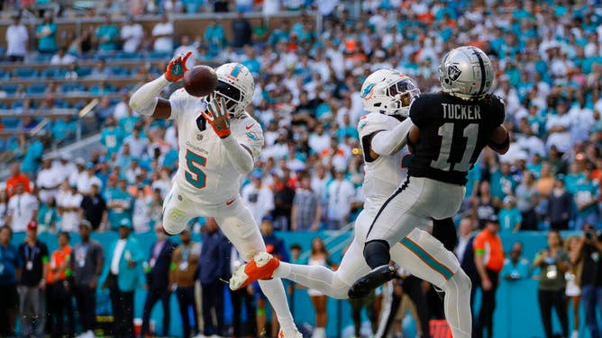 Dolphins CB Jalen Ramsey intercepts a pass by Las Vegas Raiders QB Aidan O'Connell at Hard Rock Stadium in Miami.