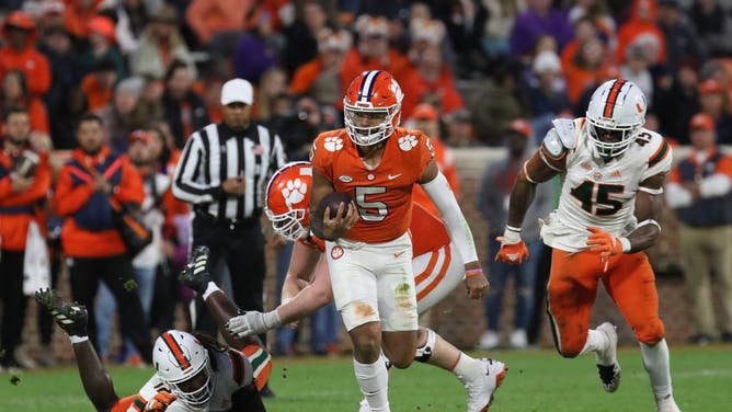 Clemson Tigers QB DJ Uiagalelei scrambles against the Miami Hurricanes at Clemson Memorial Stadium in Clemson, South Carolina.