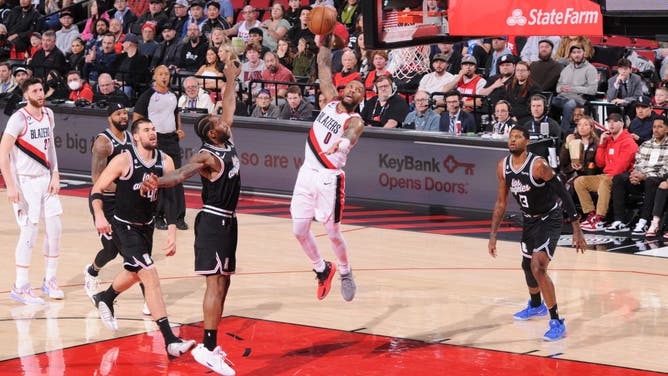 Trail Blazers All-Star Damian Lillard throws it down vs. the LA Clippers at the Moda Center Arena in Portland, Oregon.