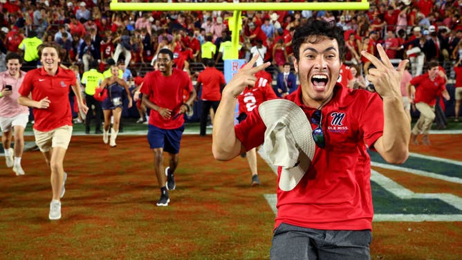Ole Miss fans storm the field following win over LSU