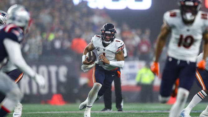 Chicago Bears QB Justin Fields scrambles during Monday Night Football against the New England Patriots at Gillette Stadium in Foxborough, Massachusetts.