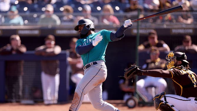 Hernandez at bat against the San Diego Padres in a spring training game at Peoria Stadium in Arizona.
