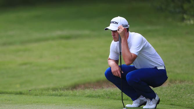 Andrew Putnam looks over a putt on the 7th green during the final round of the Charles Schwab Challenge at Colonial Country Club in Fort Worth, Texas.