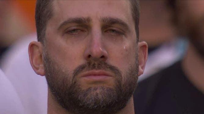 Eagles head coach Nick Sirianni cries while Chris Stapleton sings the United States National Anthem prior to the start of the Super Bowl.