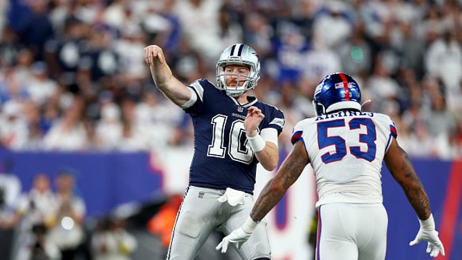 Cowboys QB Cooper Rush throws a pass against the Giants.
