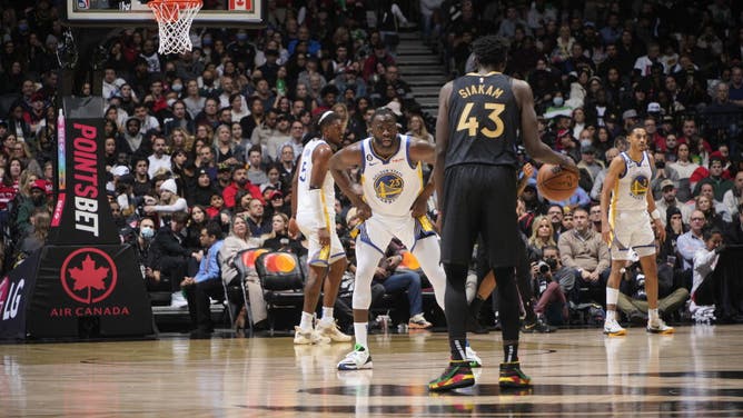 Draymond Green defends Toronto Raptors PF Pascal Siakam at the Scotiabank Arena in Toronto, Ontario, Canada.