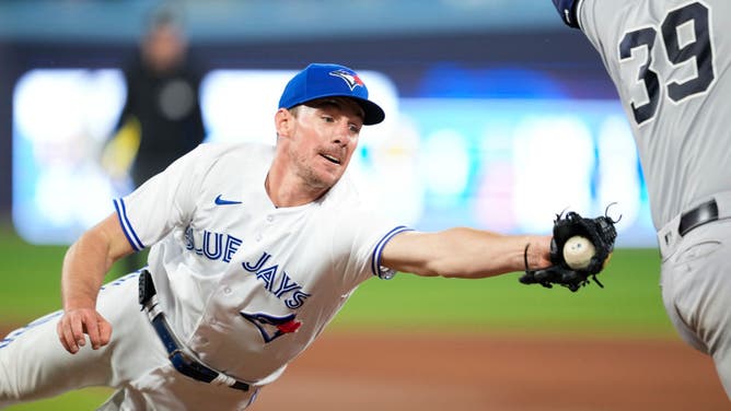 Chris Bassitt of the Toronto Blue Jays tags out Jose Trevino of the New York Yankees in the seventh inning during their MLB game at the Rogers Centre on May 17, 2023 in Toronto, Ontario, Canada.