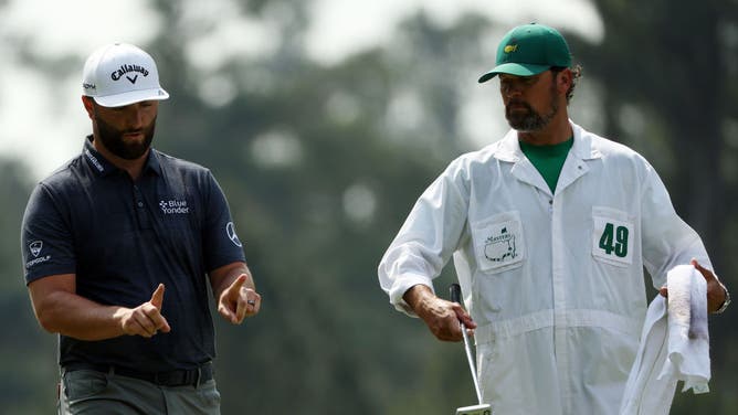 Jon Rahm showing how far that missed putt was at the Masters, probably.