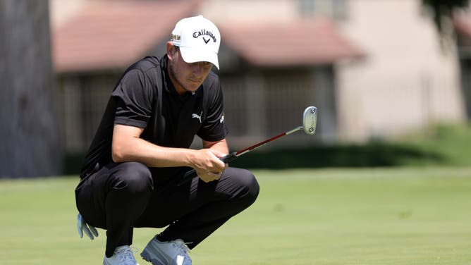 Emiliano Grillo lines up a putt on the 14th green during the 1st round of the Charles Schwab Challenge at Colonial Country Club.