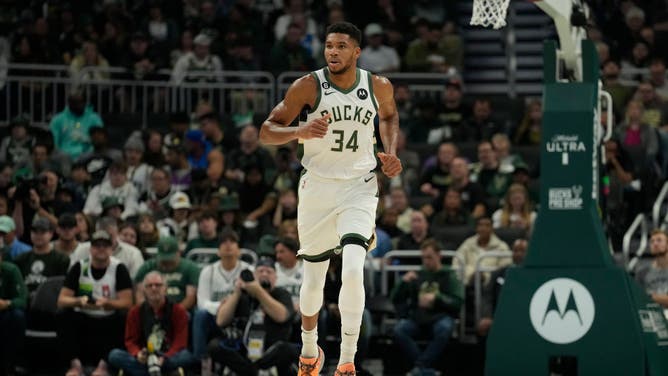 Milwaukee Bucks Giannis Antetokounmpo gallops down the court against the Detroit Pistons at Fiserv Foru in Milwaukee, Wisconsin.