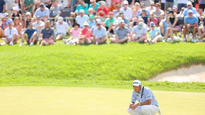 Matsuyama prepares to putt on the 18th green during the 3rd round of the 3M Open 2023 at TPC Twin Cities in Blaine, Minnesota.