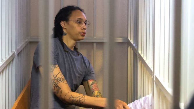Brittney Griner sitting in a prison cell in Russia.