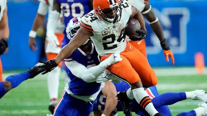 Cleveland Browns running back Nick Chubb, #24, rushes during the second half of an NFL football game against the Buffalo Bills, Sunday, Nov. 20, 2022, in Detroit.
