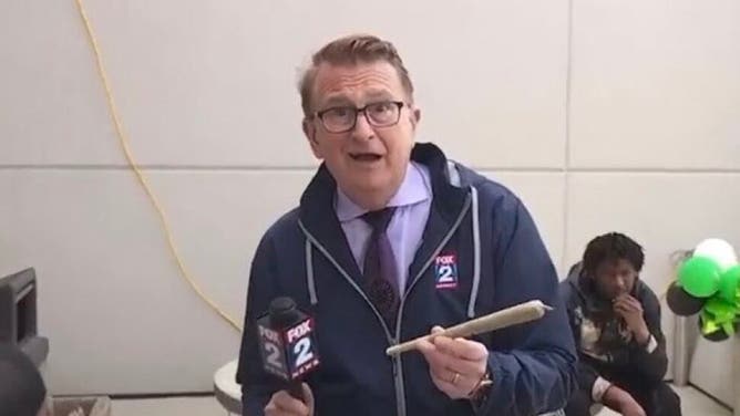 Fox 2 reporter Charlie Langton holding a massive blunt on 420 day in Detroit