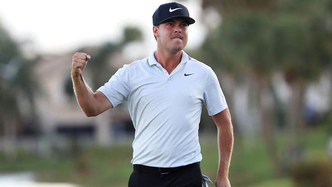 Keith Mitchell celebrates after making a birdie putt on the 18th green to win the Honda Classic at PGA National Resort in Palm Beach Gardens, Florida.