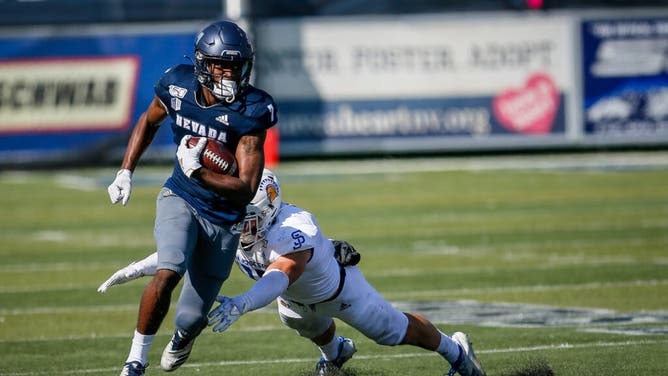 Green Bay Packers rookie wide receiver Romeo Doubs runs after the catch while playing at the University of Nevada