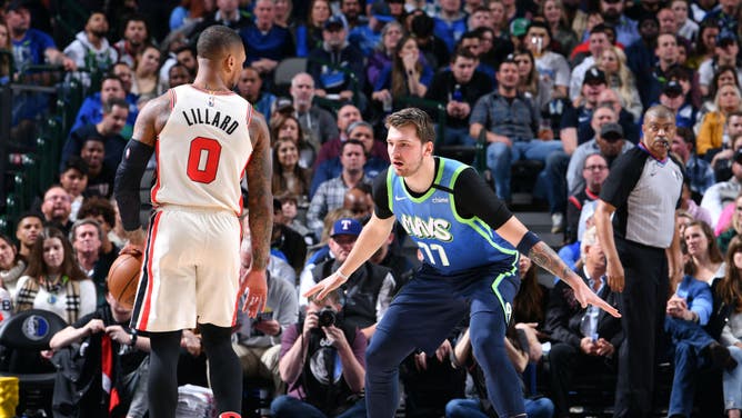 Dallas Mavericks' Luka Doncic defends Portland Trail Blazers' Damian Lillard at the American Airlines Center in Dallas.