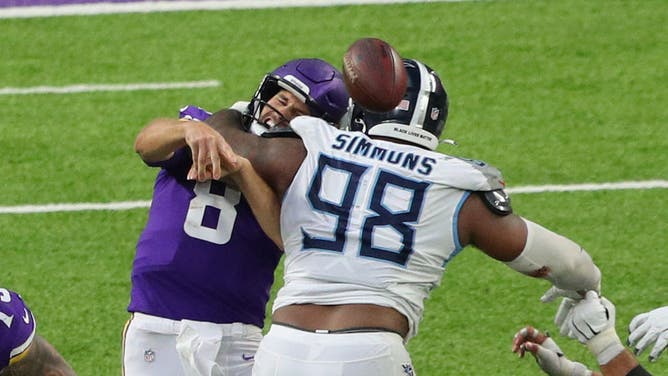 KIrk Cousins wrecked by Jeffery Simmons