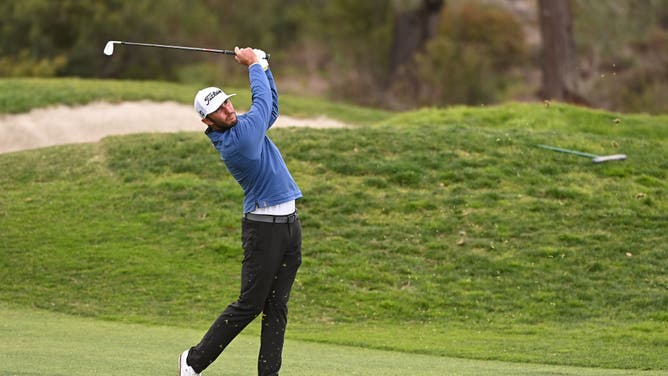 Max Homa hits a shot on the 4th fairway of the Torrey Pines North course at the Farmers Insurance Open in San Diego, California.