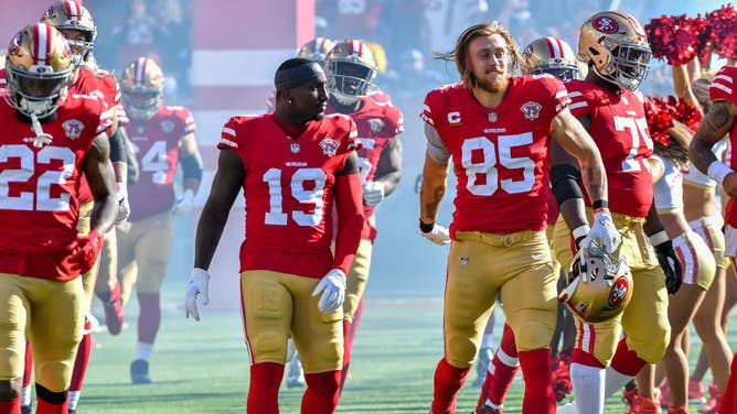 San Francisco 49ers TE George Kittle and WR Deebo Samuel enter the field at Levi's Stadium in Santa Clara, California.