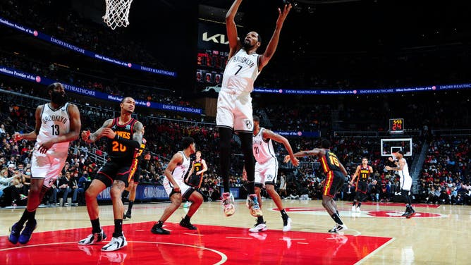Kevin Durant rebounds the ball during the game vs. the Atlanta Hawks at State Farm Arena in Atlanta, Georgia.