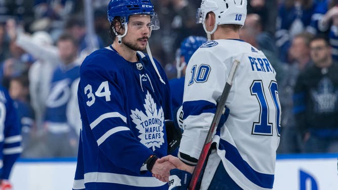 Austin matthews and Corey Perry shake hands
