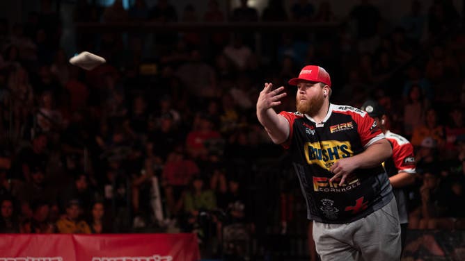 Cornholer Jamie Graham tosses a bag in a match against Mark Richards. Richards was implicated in the Bag-Gate scandal that has rocked the cornhole community to its core.