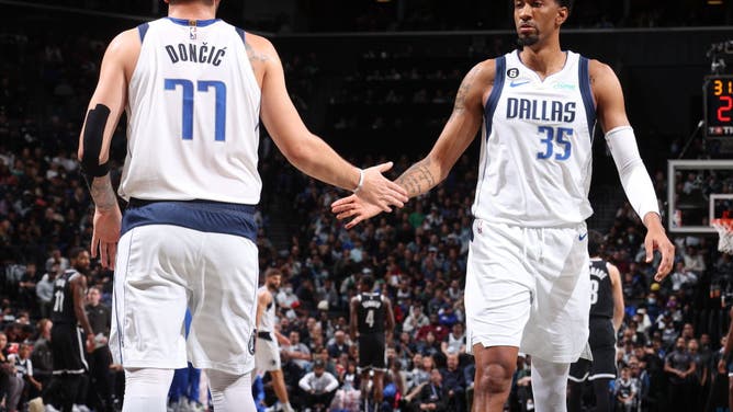 Dallas Mavericks Luka Doncic high-fives Christian Wood against the Brooklyn Nets at Barclays Center in Brooklyn.