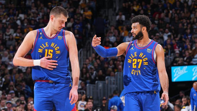 Denver Nuggets C Nikola Jokic and PG Jamal Murray strategize about how to light the San Antonio Spurs up at the Ball Arena in Denver.