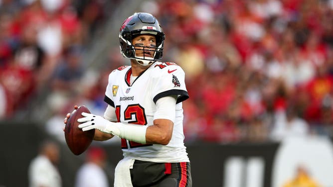 Tampa Bay Buccaneers QB Tom Brady drops back to pass during the first quarter of an NFL football game against the Los Angeles Rams at Raymond James Stadium in Tampa, Florida.
