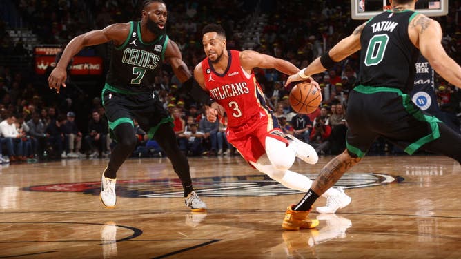 New Orleans Pelicans' CJ McCollum drives to the basket during the game against the Boston Celtics at the Smoothie King Center in New Orleans.