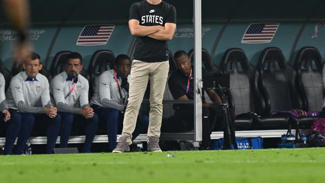 US Soccer coach Gregg Berhalter wearing a shirt that says