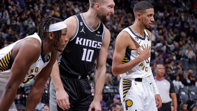 Pacers' Myles Turner and Tyrese Haliburton and Kings' Domantas Sabonis at Golden 1 Center in Sacramento, California.