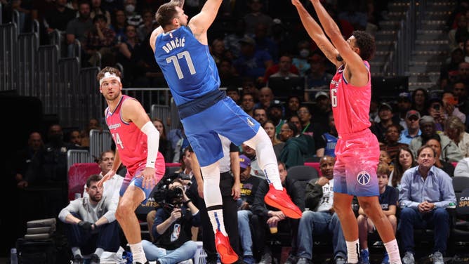 Dallas Mavericks All-Star Luka Doncic shoots the ball during the game vs. the Washington Wizards at Capital One Arena in Washington, DC.