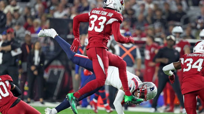 New England Patriots WR DeVante Parker tumbles to the ground in the first quarter. Parker hit his head on the play and did not return as he was evaluated for a concussion.