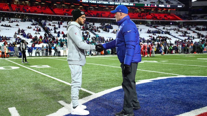 Dolphins coach Mike McDaniel shakes hands with Bills coach Sean McDermott prior to an AFC East showdown at Highmark Stadium in Orchard Park, New York.