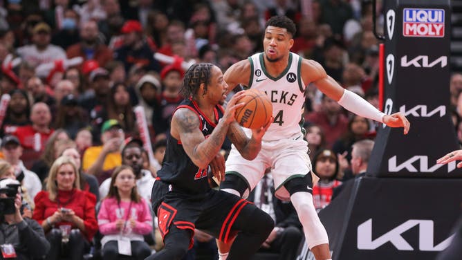 Giannis Antetokounmpo defends DeMar DeRozan in the post at the United Center in Chicago.
