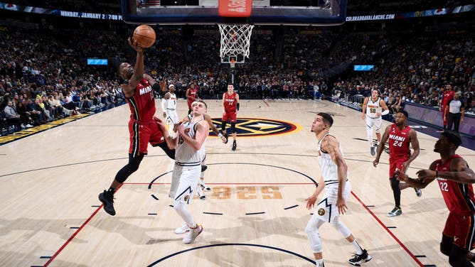 Heat C Bam Adebayo attacks the paint against the Nuggets at the Ball Arena in Denver.