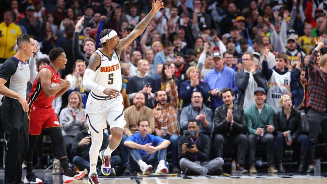 Nuggets SG Kentavious Caldwell-Pope celebrates a 3-pointer vs. the Miami Heat at Ball Arena.