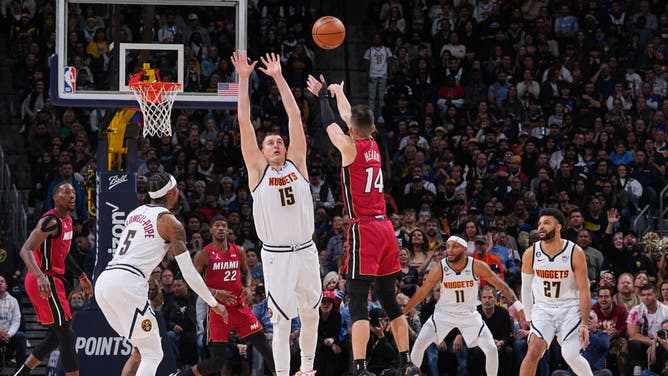 Miami Heat SG Tyler Herro chucks a 3-pointer vs. the Denver Nuggets at the Ball Arena.