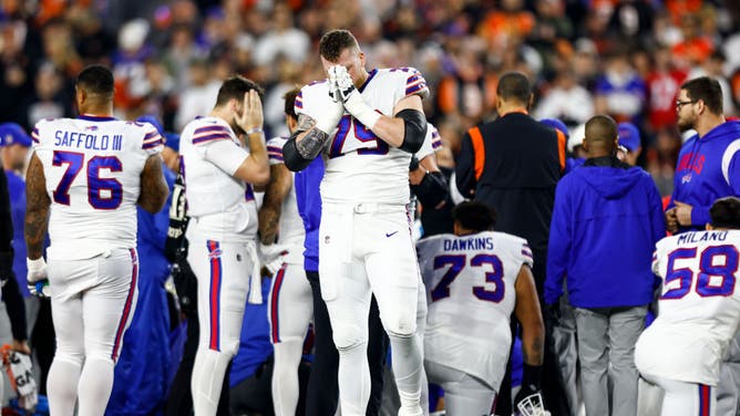Spencer Brown of the Buffalo Bills reacts to an injury sustained by Damar Hamlin during the first quarter of an NFL football game against the Cincinnati Bengals at Paycor Stadium on January 2, 2023 in Cincinnati, Ohio.