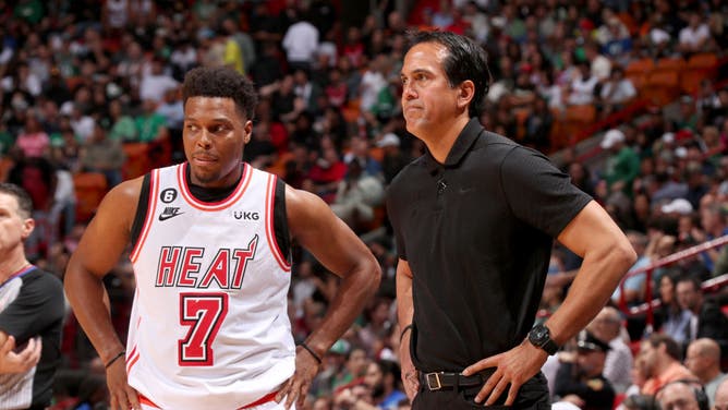 Miami Heat PG Kyle Lowry and coach Erik Spoelstra strategize during a game vs. the Boston Celtics at Miami-Dade Arena in Miami.