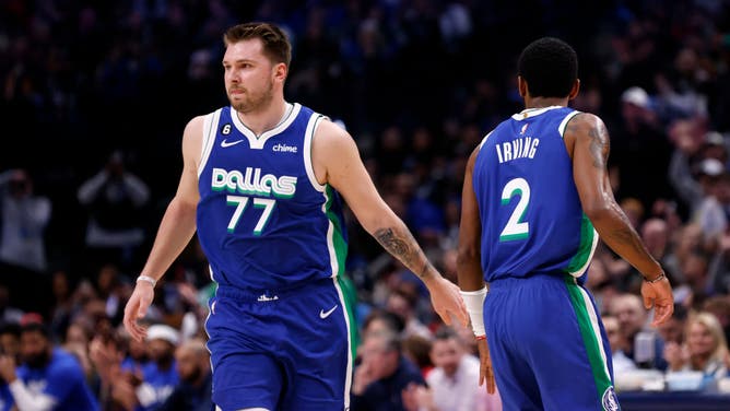 Mavericks' Luka Doncic and Kyrie Irving celebrate a basket vs. the Minnesota Timberwolves at American Airlines Center in Dallas.