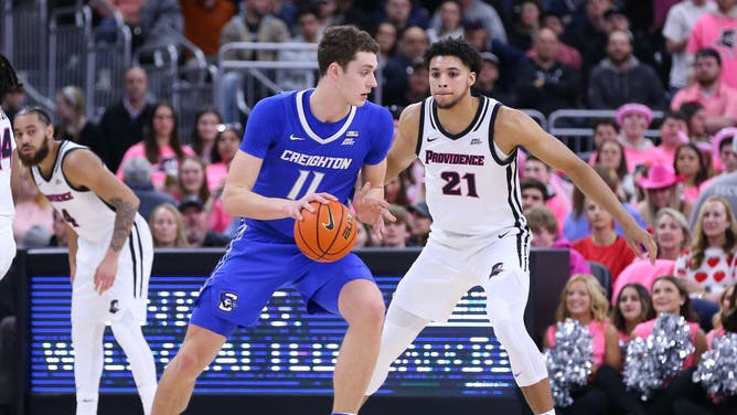 Creighton Bluejays C Ryan Kalkbrenner posting up Providence Friars F Clifton Moore at Amica Mutual Pavilion in Providence, Rhode Island.