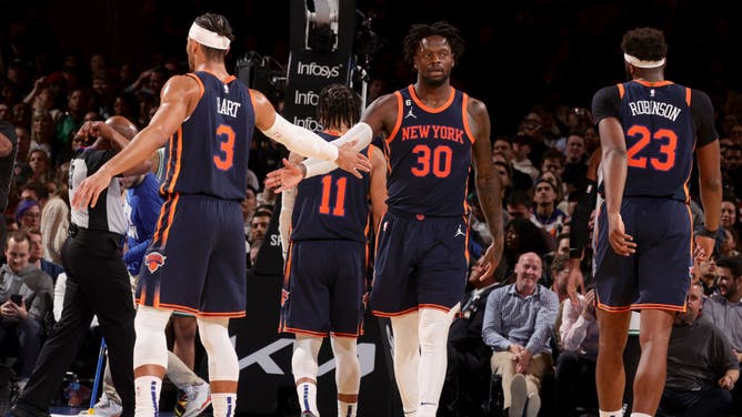 Knicks' Julius Randle high-fives Josh Hart during the game vs. the Celtics at Madison Square Garden.