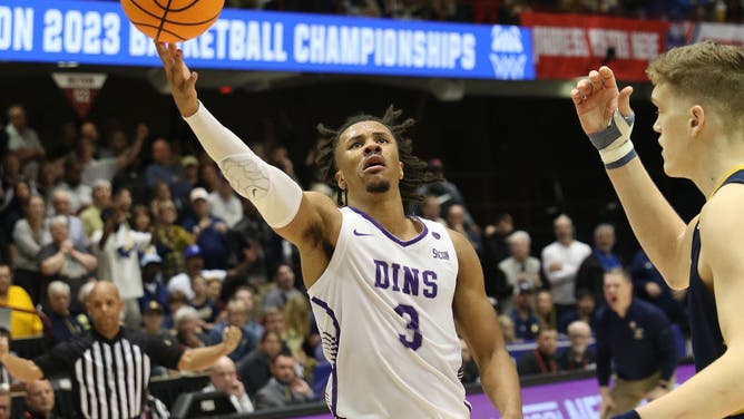Furman guard Mike Bothwell takes a layup during the Southern Conference Championship vs. the Chattanooga Mocs at Harrah's Cherokee Center in Asheville, North Carolina.