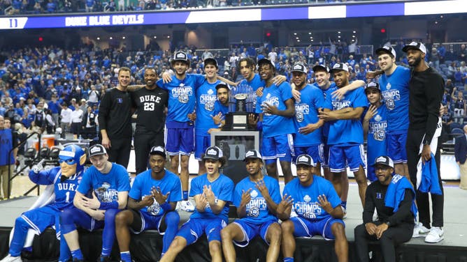 The Duke Blue Devils celebrate after winning the ACC Championship at Greensboro Coliseum in Greensboro, North Carolina.
